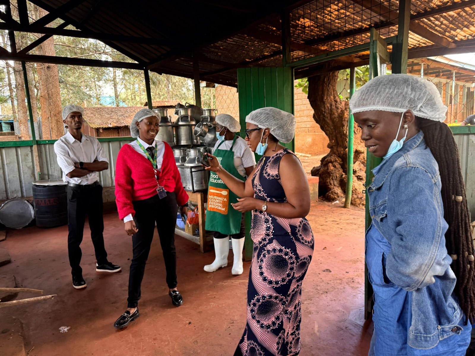 The Msitu360 team at work in a community kitchen